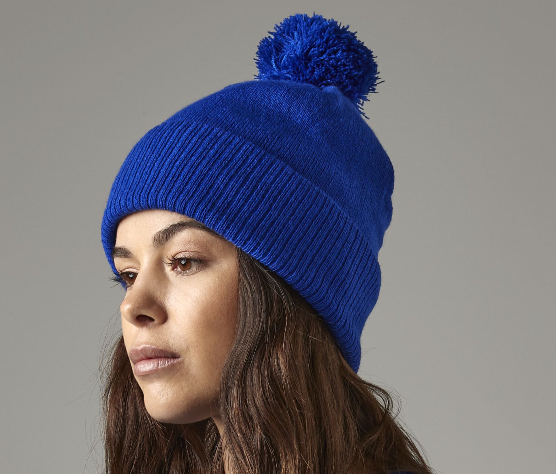 Bonnet avec pompon et intérieur polaire