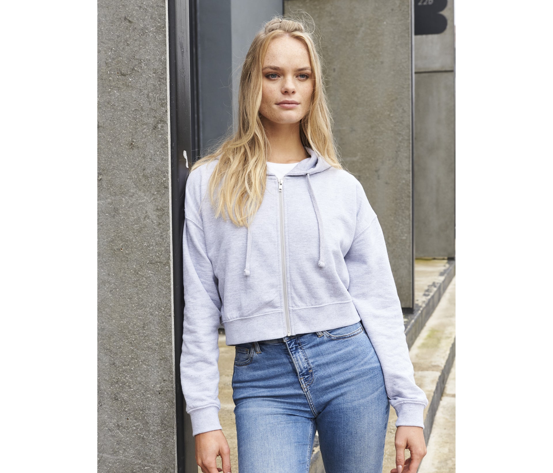 Sweat court zippé femme