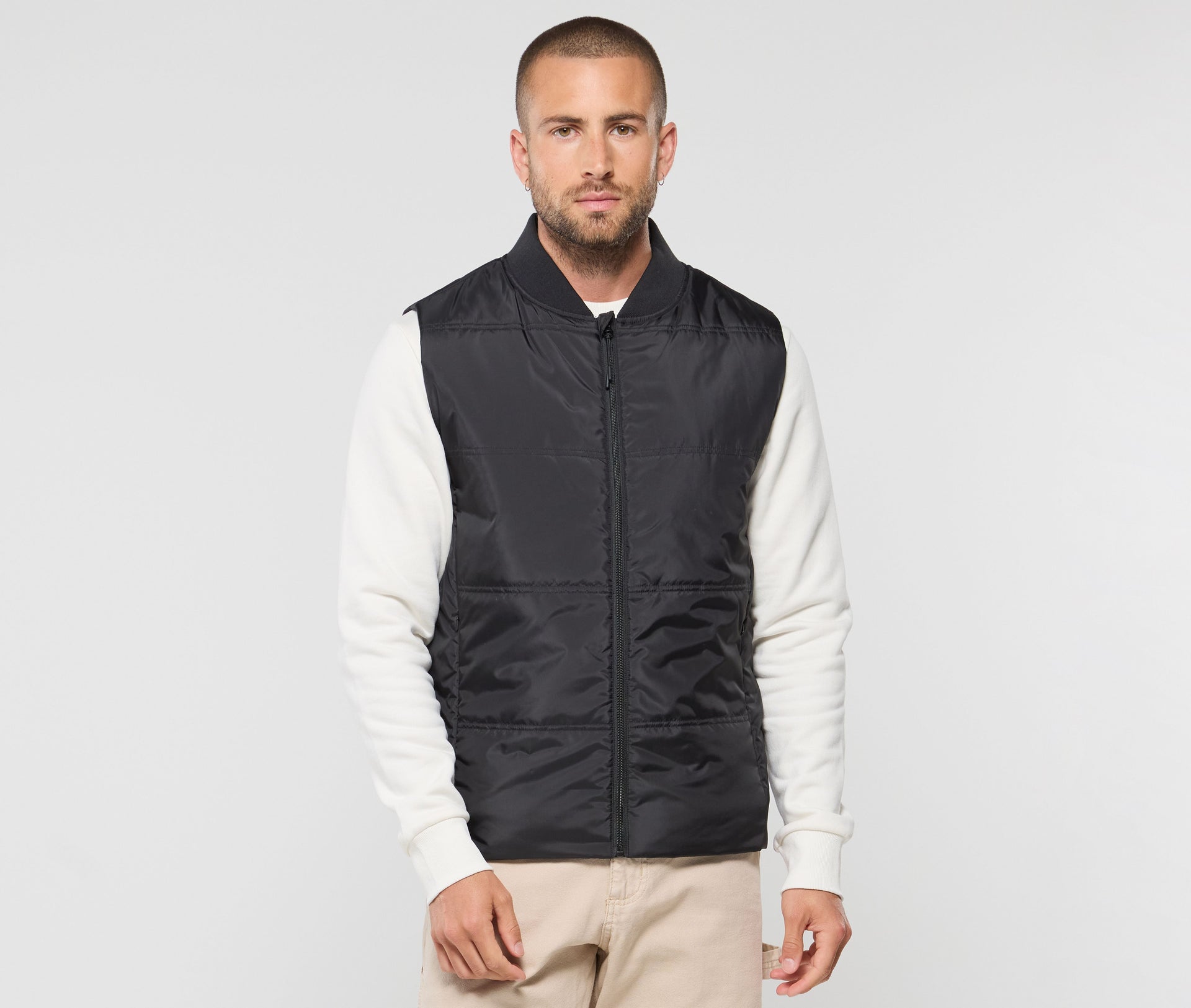 Bodywarmer unisexe avec bord côte au col