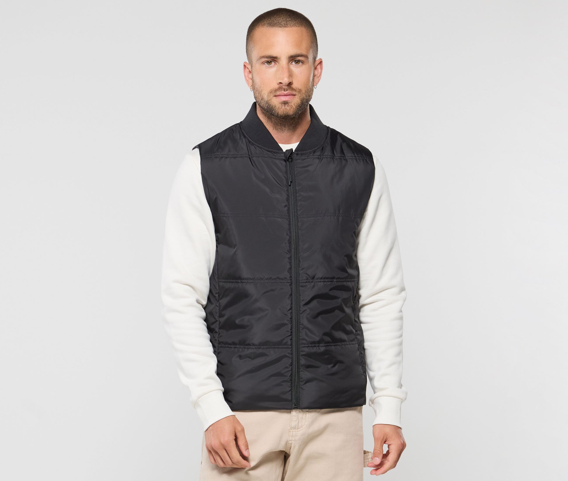 Bodywarmer unisexe avec bord côte au col